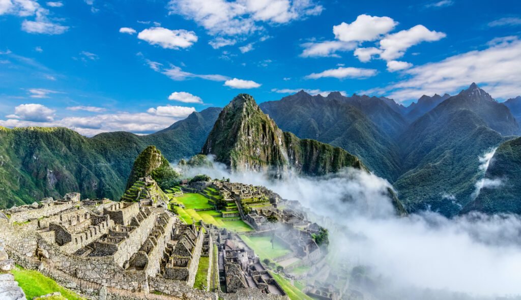 Overview of Machu Picchu, agriculture terraces and Wayna Picchu peak in the background